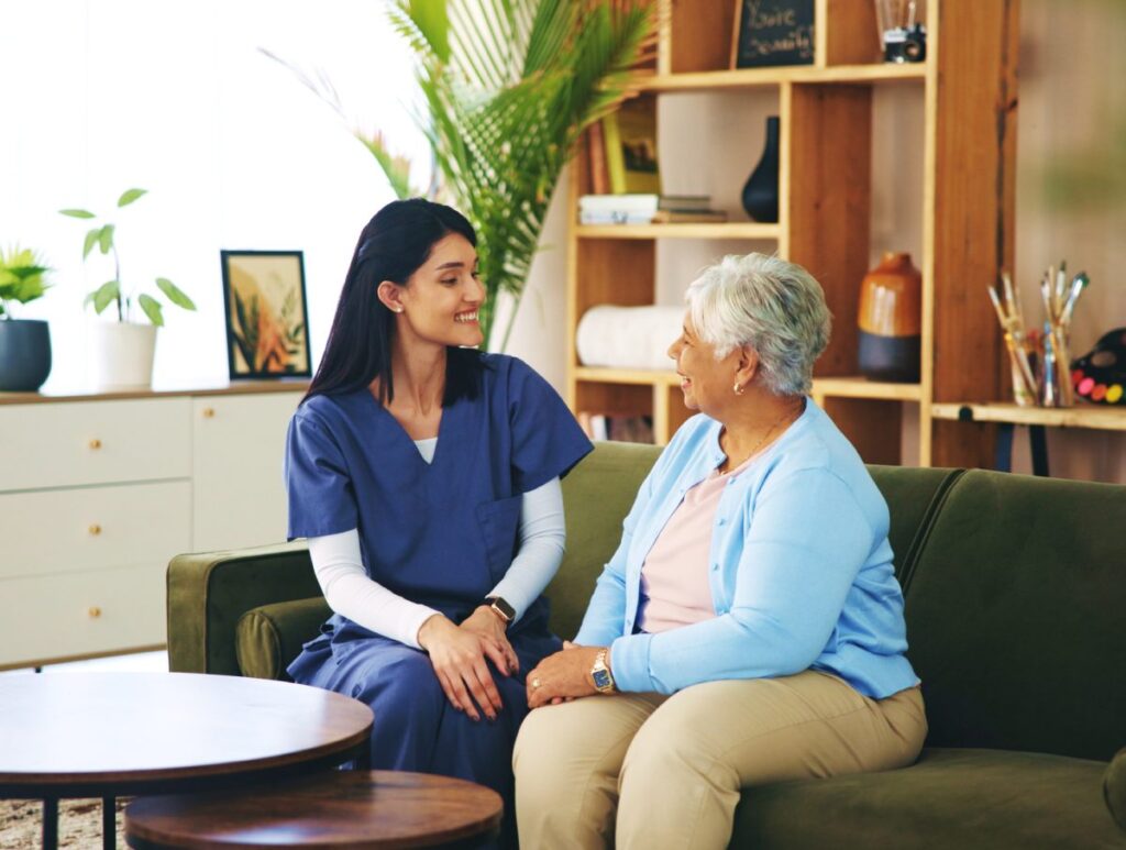 The Gardens of Amarillo | Senior woman talking with nurse