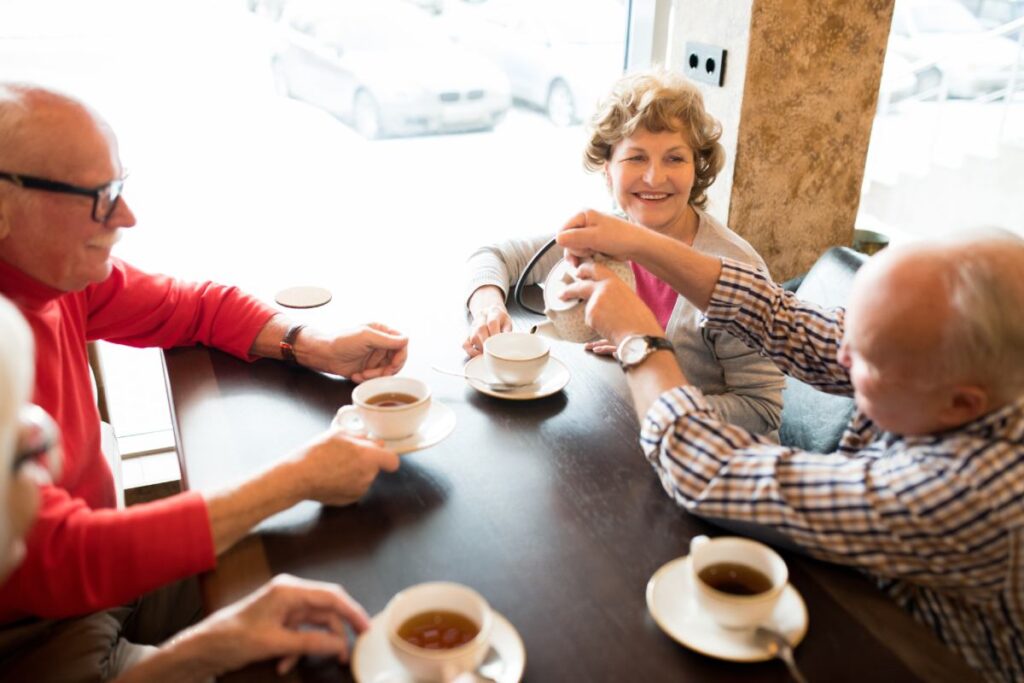 The Gardens of Amarillo | Seniors having coffee together