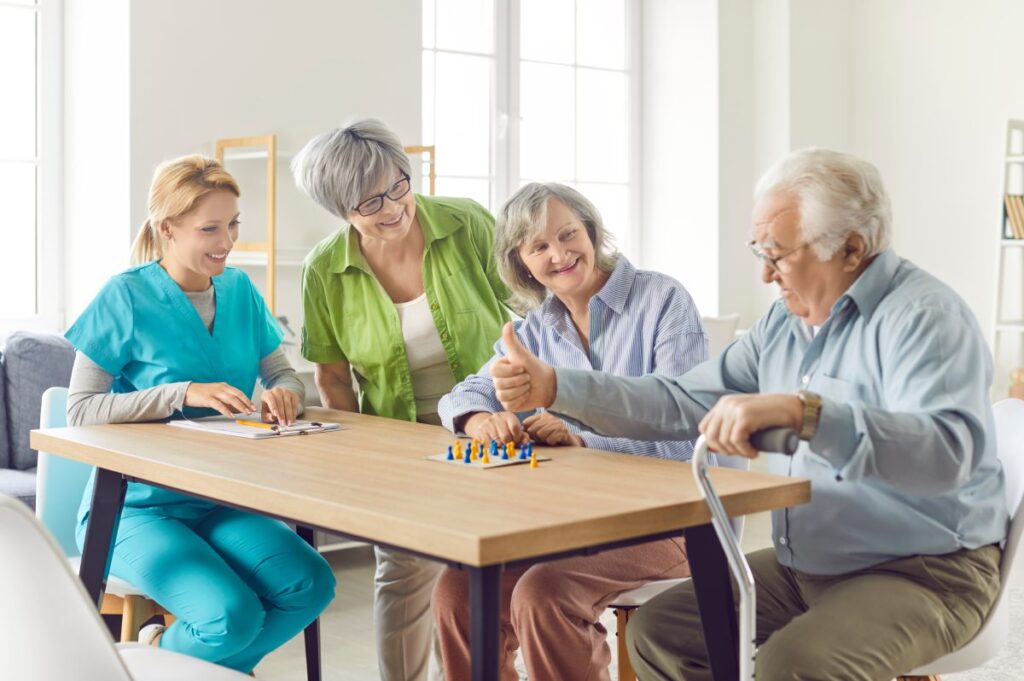 The Gardens of Amarillo | Group of seniors playing a game together